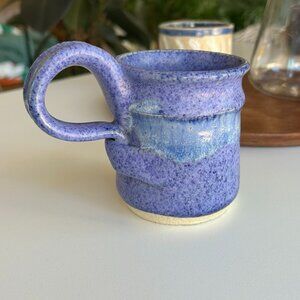 handmade blue ceramic mug with twisty handle